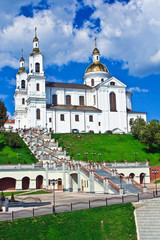 Fototapeta na wymiar Russian Orthodox Assumption Cathedral in Vitebsk, Belarus. Church Vilno Baroque architectural style.