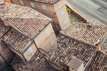  Old stone living houses along empty street, Italy