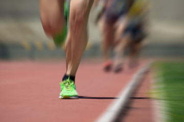 Athletics people running on the track field,abstract