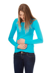 Obraz premium Woman having stomachache