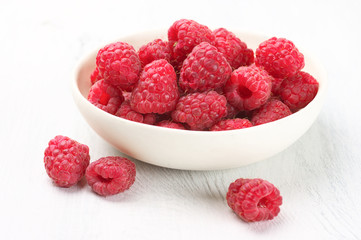 Raspberries in white bowl