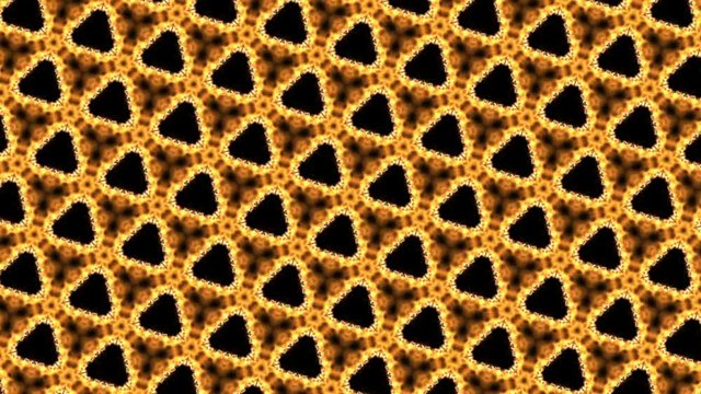 Caleidoscopio digital dinamico de formas triangulares en tonos de fuego 
