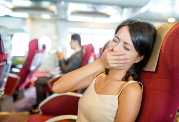 Woman feeling sick on boat