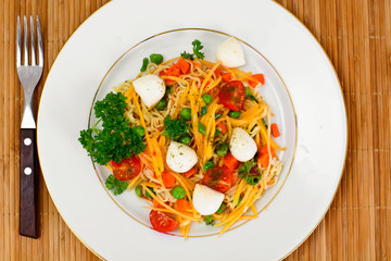 Warm Salad of Noodles, Pumpkin, Carrots, Peas with Cherry Tomato