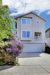 Old small green home with porch