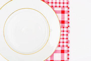 White Empry Plate on a Tablecloth with Place for Your Text