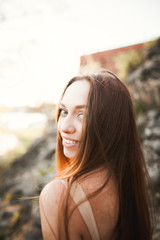 beautiful young woman with long dress close-up portrait