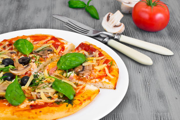 Pizza with Mushroom, Cheese, Mozzarella, Olives and Basil