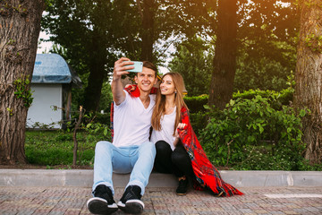 Beautiful young couple makes selfie