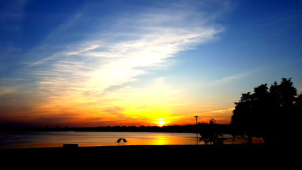 Beautiful landscape with sunset on river. Oil paint landscape in post production.