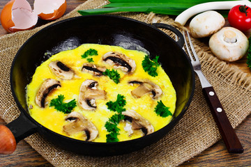 Healthy and Diet Food: Scrambled Eggs with Mushrooms and Vegetab