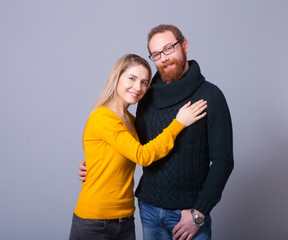 Young woman and a young man in the studio