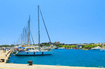 Fototapeta na wymiar Luxury Yacht docked at Rhodes Port,Greece sunny day