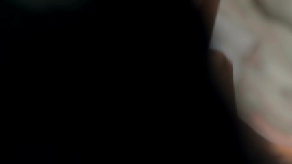 Girlfriends help the bride to wear a wedding dress