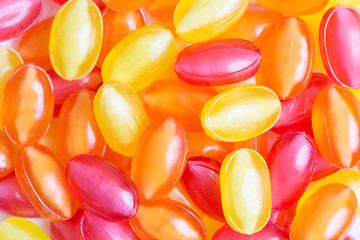 Background red, orange and yellow lolly pops
