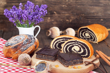 Poppy seed rolls, strudels and cakes with lavender in background