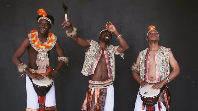 African tribe dancing and drumming