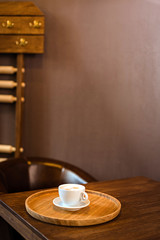 cup on wooden background