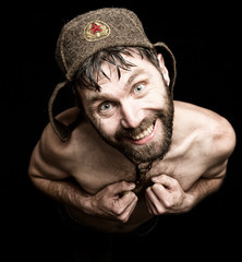 Dark portrait of scary evil sinister bearded man with smirk, makes various hand's signs and expresses different emotions. strange Russian man