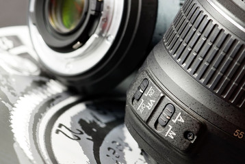 Macro of black DSLR. Camera lens details.