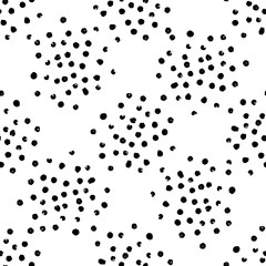 Vector seamless modern messy polka dot pattern.