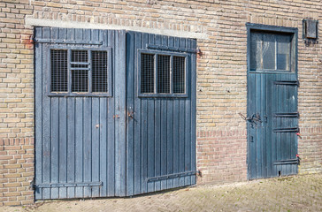 Part of the facade of a now demolished barn