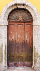 Fototapeta na wymiar Closeup of an wooden door, Italy, sept. 2015