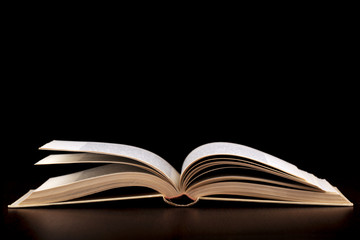 old book on a black background