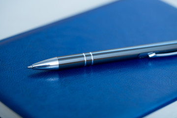 pen with notebook