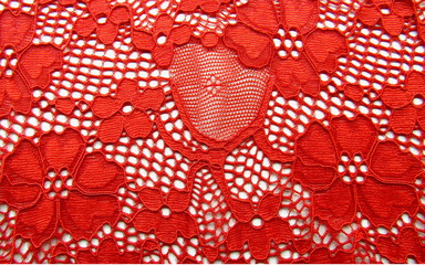 Red lace with flowers on white texture