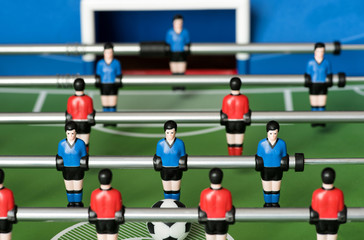 Red and blue players in a table football game