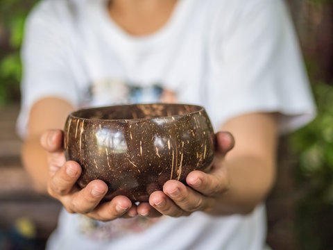 Coconut bowl on hand
