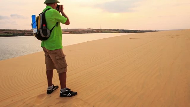 Closeup Tourist Photos Landscape in White Sand Dunes