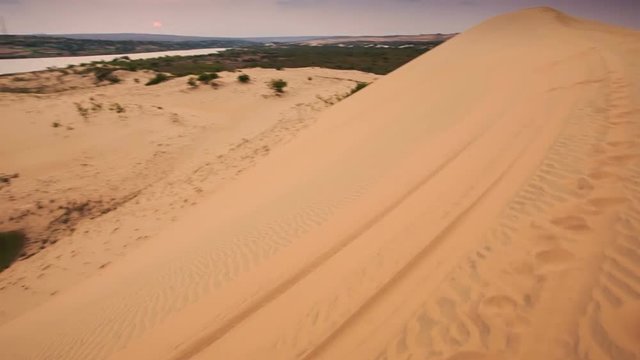 Tourist Photos Landscape on Crest of White Sand Dunes