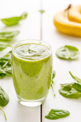 Absolutely Amazing Tasty Green Avocado Shake, Made with Fresh Avocados, Banana, Lemon Juice and Non Dairy Milk (Almond, Coconut) on Light White Wooden Background, Raw, Vegan Drink Conception, Close-up