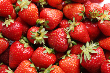 Fresh and tasty strawberries background, close up