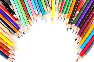 Drawing colourful pencils on a white background, close up