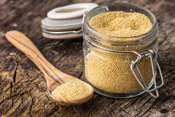 Raw Organic Amaranth Grain on wooden background