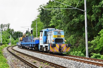 Small, old cargo train.