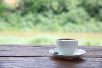 cappuccino coffee on wood background