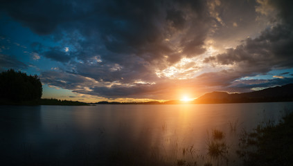 Fototapeta na wymiar colorful of a Summer sunset at a new Hampshire lake,USA, America
