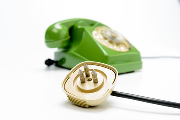 Presa telefonica con telefono vintage, fuoco selettivo