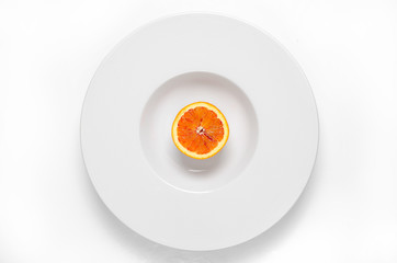 Chopped orange on the plate