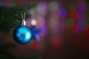Fototapeta premium Christmas tree with decor on bright background, closeup