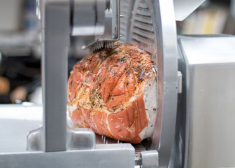 Cooked Prosciutto Cotto Ham With Herbs. Gourmet Meat Deli, Meat Slicer. - obrazy, fototapety, plakaty