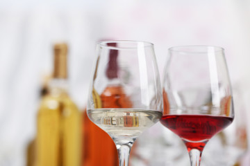 Wine glasses with red and white wine, closeup