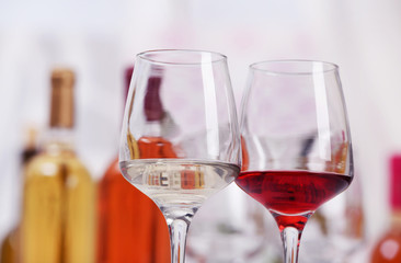 Wine glasses with red and white wine, closeup