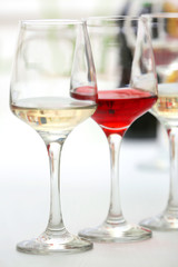 Wine glasses with red and white wine, closeup