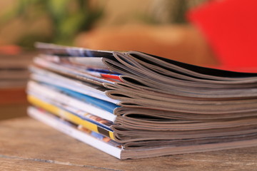 Magazines on the wooden table