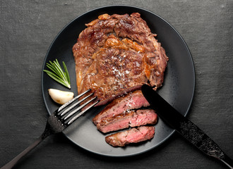 Medium rare grilled Steak Ribeye. Top view